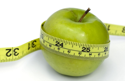 weight loss apple with table measeure around it
